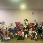 Residents from Care UK's Mountfitchet House and pupils from Elsenham Primary School have been sharing their favourite stories