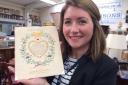 Hansons valuer Isabel Murtough holds the Valentine. Picture: Hansons