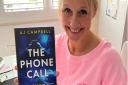 Author AJ Campbell with her new book called The Phone Call
