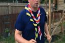 Stephen Johnson of 1st Thaxted - Carver Scout Group running around his garden to raise NHS cash. Picture: Stephen Johnson family