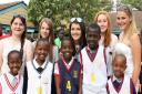 Felsted students with pupils of Basura Primary School, Kenya