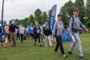 Participants take part in the Rotary in Saffron Walden's Jubilee Walden Walk, which started on The Common