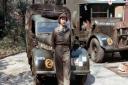 Princess Elizabeth stood in front of an L-plated truck during her time in the Auxiliary Territorial Service (ATS).