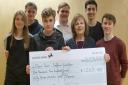 Sixth formers at Saffron Walden County High present the cheque to Open Door Counselling