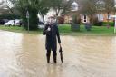Henham parish councillor Rory Gleeson looking upbeat despite the flooding in Station Road, Elsenham, in 2014.