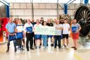 GT Engine Services presented a cheque to Mind in West Essex