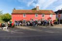 Villagers gathered in support outside the Fleur de Lys in Widdington