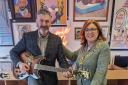 Sean collecting the guitar from Mayor of Saffron Walden Cllr Heather Asker
