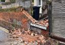 A damaged brick wall on Little Walden Road, Saffron Walden caused by Storm Eunice