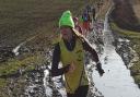 Mud is a very common feature of the cross-country competition enjoyed by Saffron Striders.
