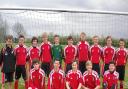 Andy (far left) with one of the two teams when they were at school