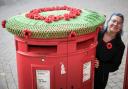 Anna with her crocheted pillar box top in Saffron Walden