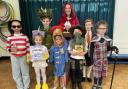 Pupils at St Thomas More School, with teacher Miss Bissett, got dressed up for World Book Day