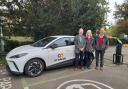 Councillors Neil Reeve, Petrina Lees and Paul Gadd welcome the first vehicle for the Electric Car Club
