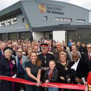 The Essex and Herts Air Ambulance CEO Jane Gurney declares the new base open, with help from patient Maisie Moon