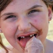 Six-year-old Sophie enjoys an ice cream
