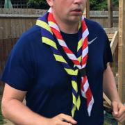 Stephen Johnson of 1st Thaxted - Carver Scout Group running around his garden to raise NHS cash. Picture: Stephen Johnson family