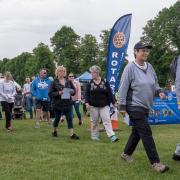 Participants take part in the Rotary in Saffron Walden's Jubilee Walden Walk, which started on The Common