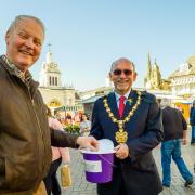 Generous passers-by added money to the collection bucket during the Rock Choir concert in the Market Square, held by Saffron Walden mayor Richard Porch