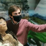 An Old Stone Age woman invites visitors to share a ‘selfie’ against an Ice Age backdrop at Saffron Walden Museum