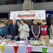 Scouts in Saffron Walden at a previous fundraising cake sale. Pic: Caroline Reeve