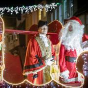 Cllr James de Vries and Father Christmas led the lantern parade in Saffron Walden