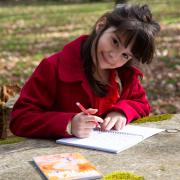 Nine-year-old poet Lily Frisenda Thomas has had her work published