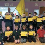 Newly invested members of The Curlews cub pack