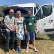 Cllr Neil Reeve, portfolio holder for environment and climate change, Cllr Petrina Lees, leader of the council,  and Ben Brown, assistant director of environmental services, with the new electric van
