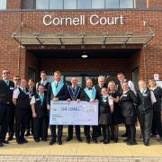 The team at Café Cornell accepted the donation from Freemasons James Perry, Tom Hales and Mark Took, on behalf of the Jubilee Hub