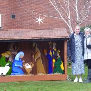 Ali Smith and one of her helpers at the Nativity scene outside Saffron Walden Baptist Church
