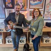 Sean collecting the guitar from Mayor of Saffron Walden Cllr Heather Asker