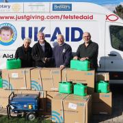 Pauline Craven and Alan Hilliar of UK-Aid with Rotarians John Tapscott and David Boreham