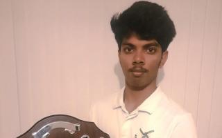 Manith De Silva of Aythorpe Roding with the prize for being the league's best young player. Picture: ARCC