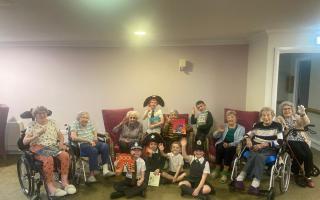 Residents from Care UK's Mountfitchet House and pupils from Elsenham Primary School have been sharing their favourite stories
